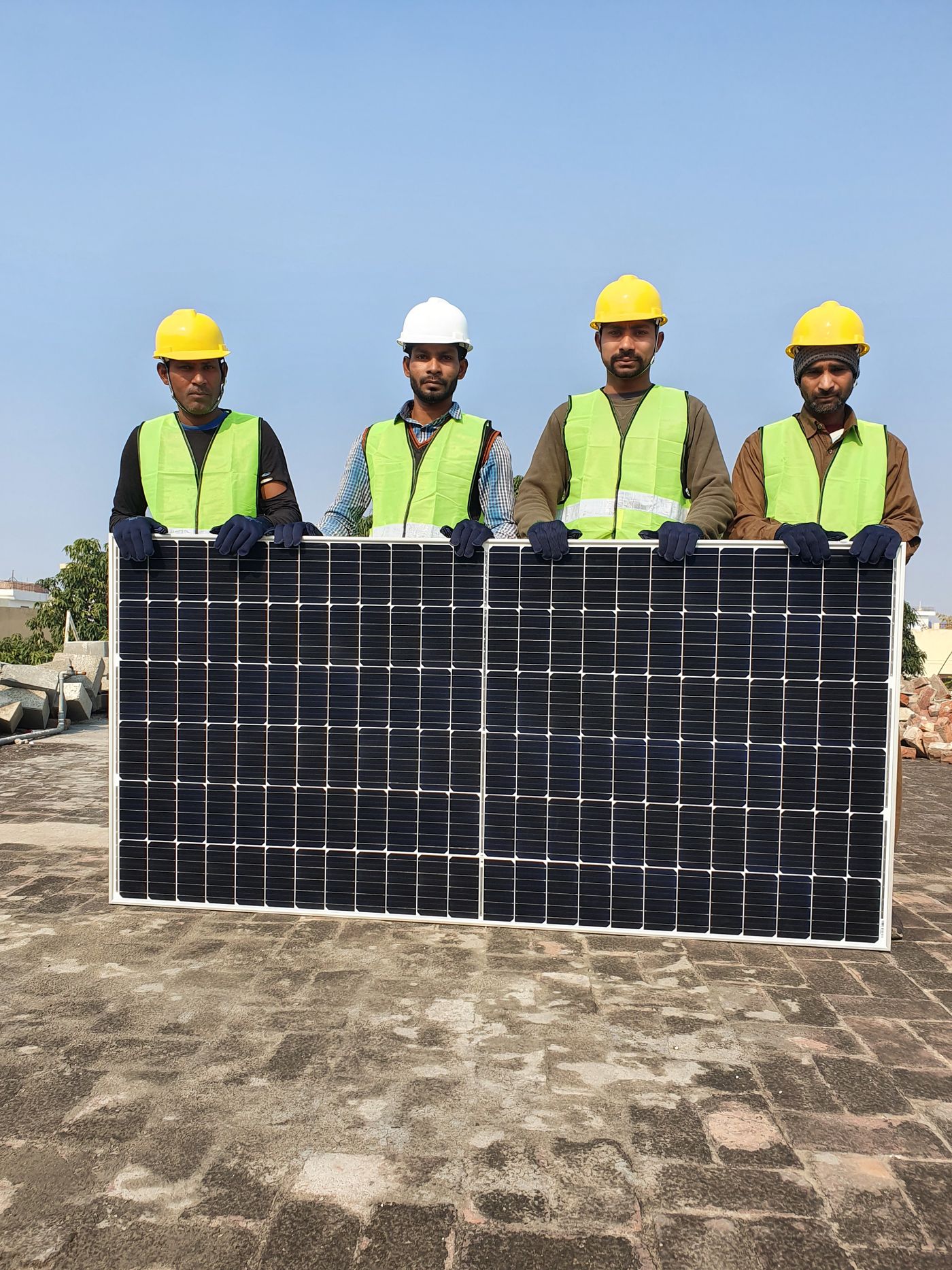 Solar panel powering an off-grid camping setup